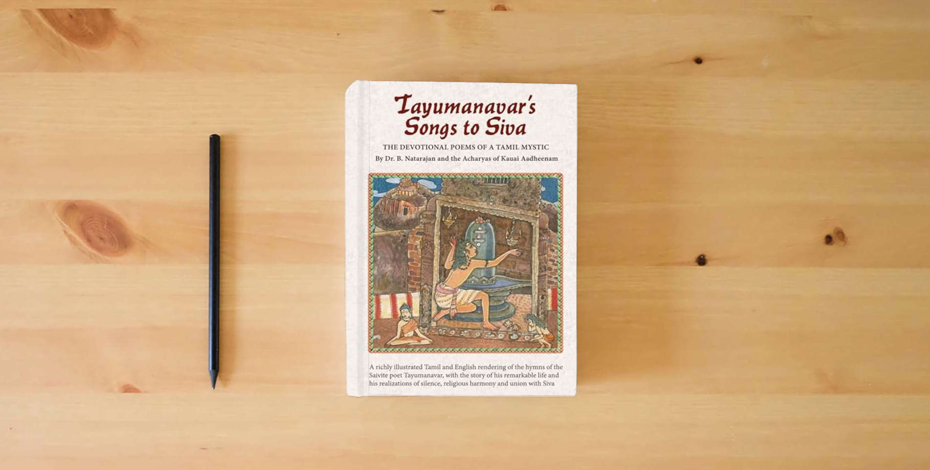 The book Tayumanavar's Songs to Siva: The Devotional Poems of a Tamil Mystic is on the table