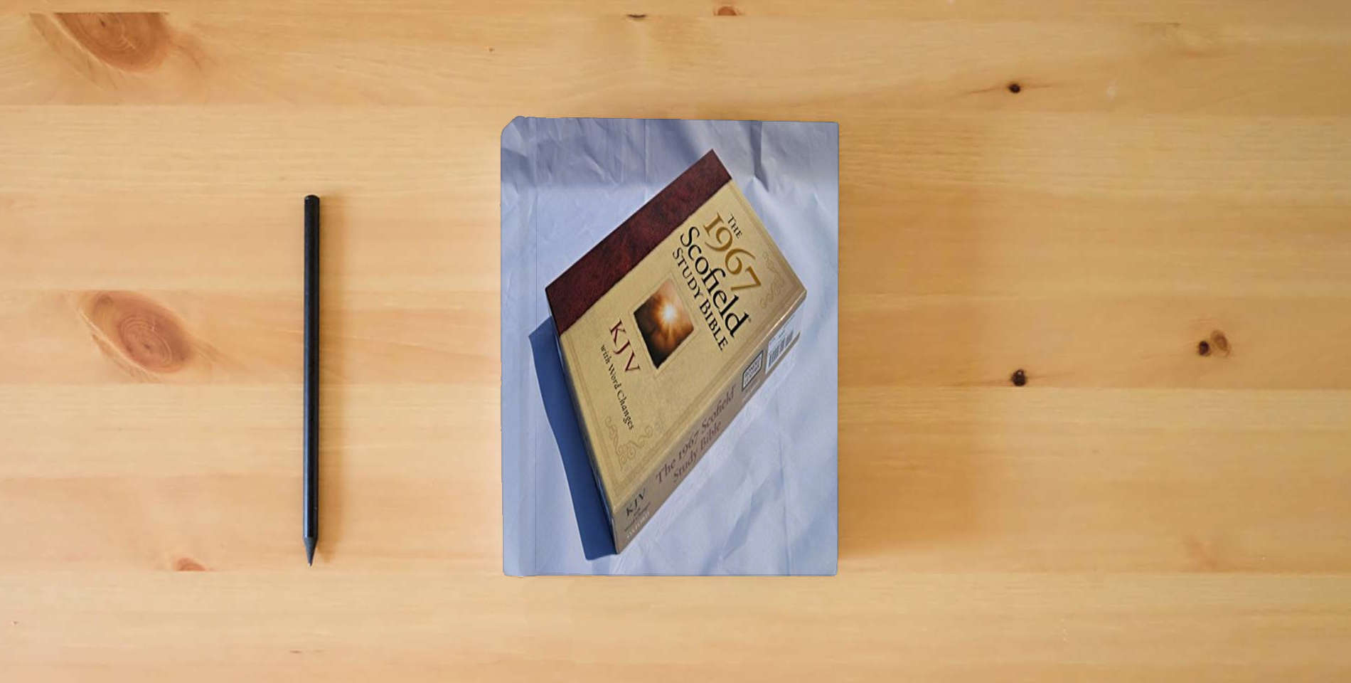 The book The 1967 ScofieldRG Study Bible, KJV, with Word Changes (Black) is on the table