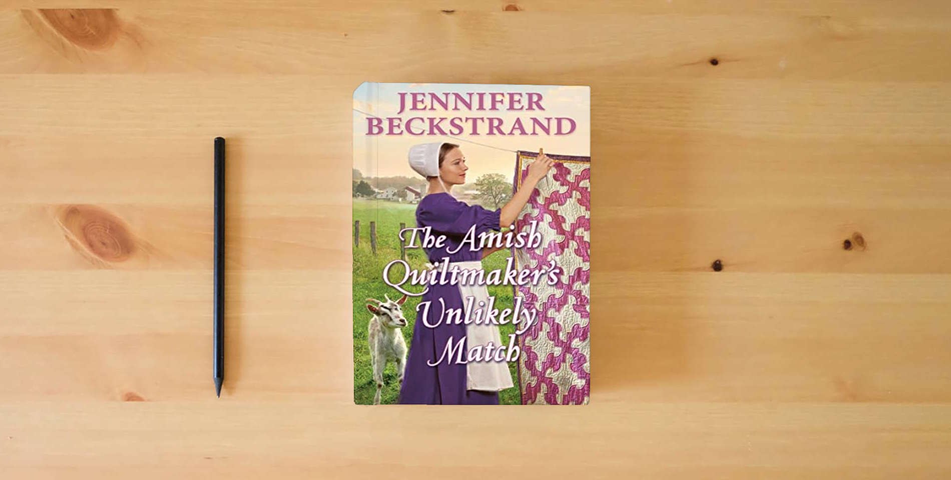 The book The Amish Quiltmaker's Unlikely Match is on the table