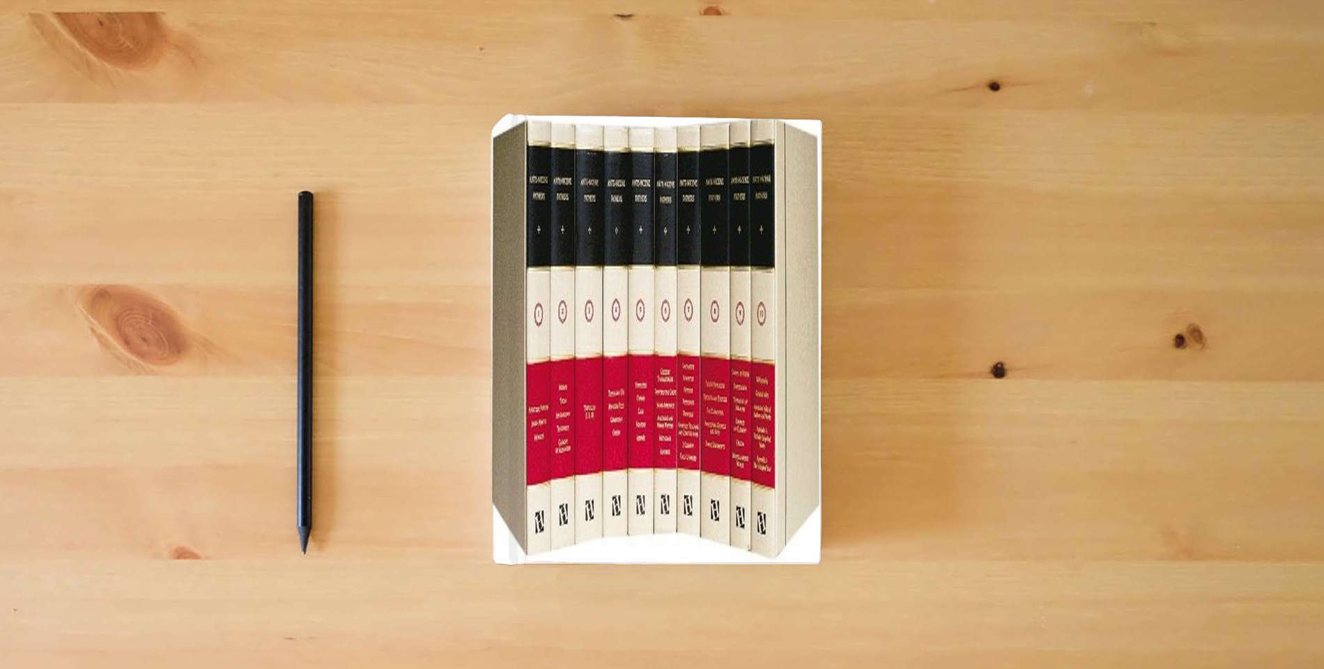 The book The Ante-Nicene Fathers (10 Volume Set) is on the table