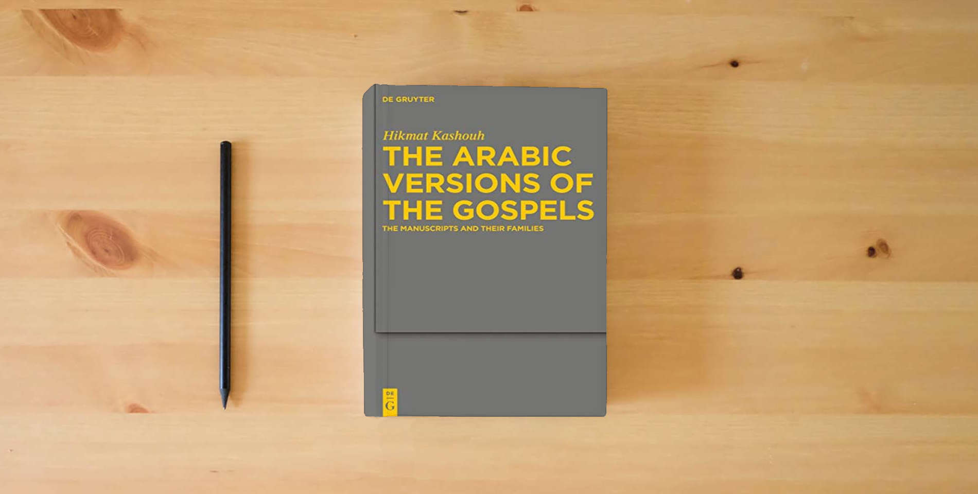 The book The Arabic Versions of the Gospels: The Manuscripts and their Families (Arbeiten zur neutestamentlichen Textforschung, 42) is on the table
