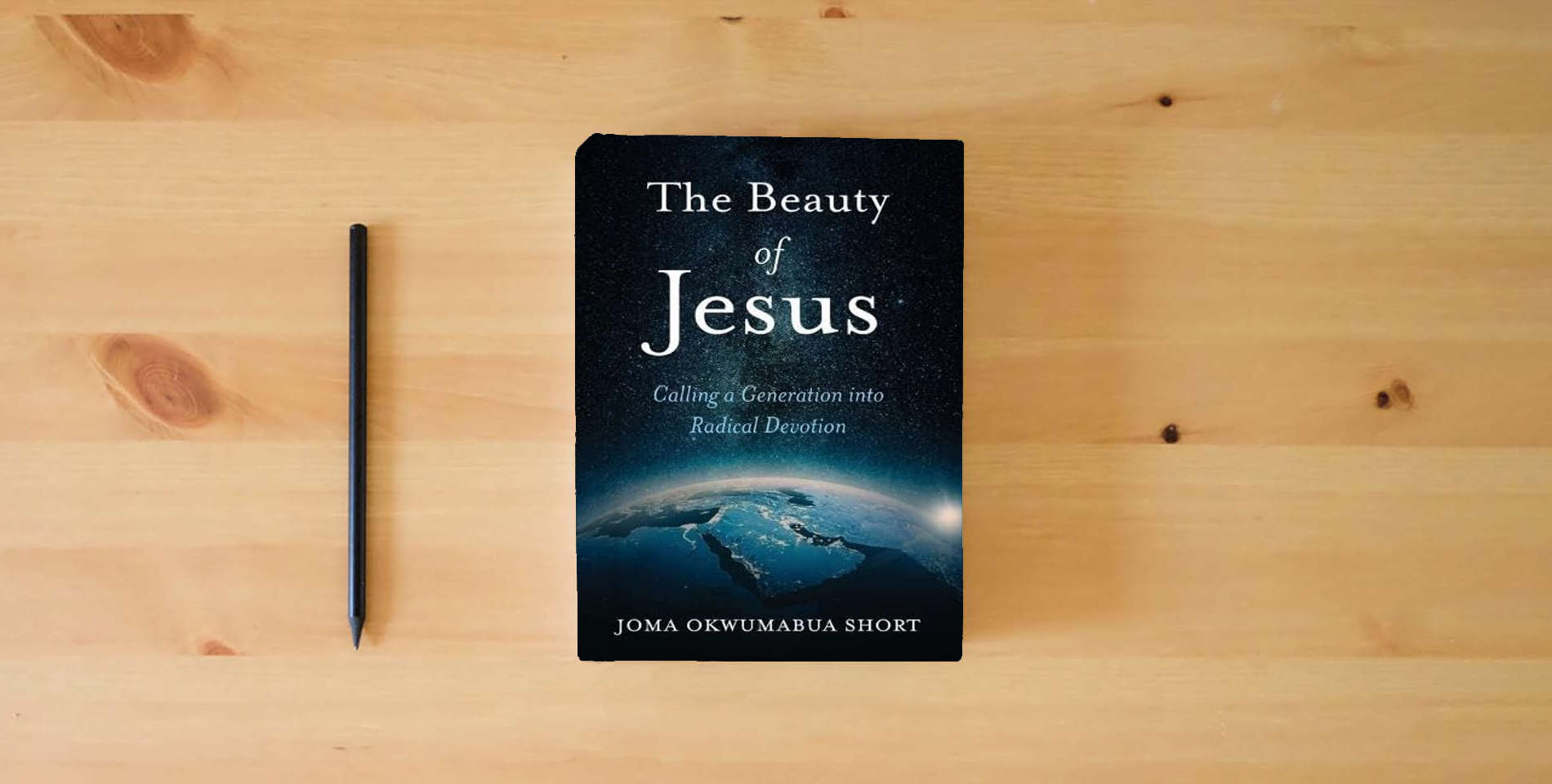 The book The Beauty of Jesus: Calling a Generation into Radical Devotion is on the table