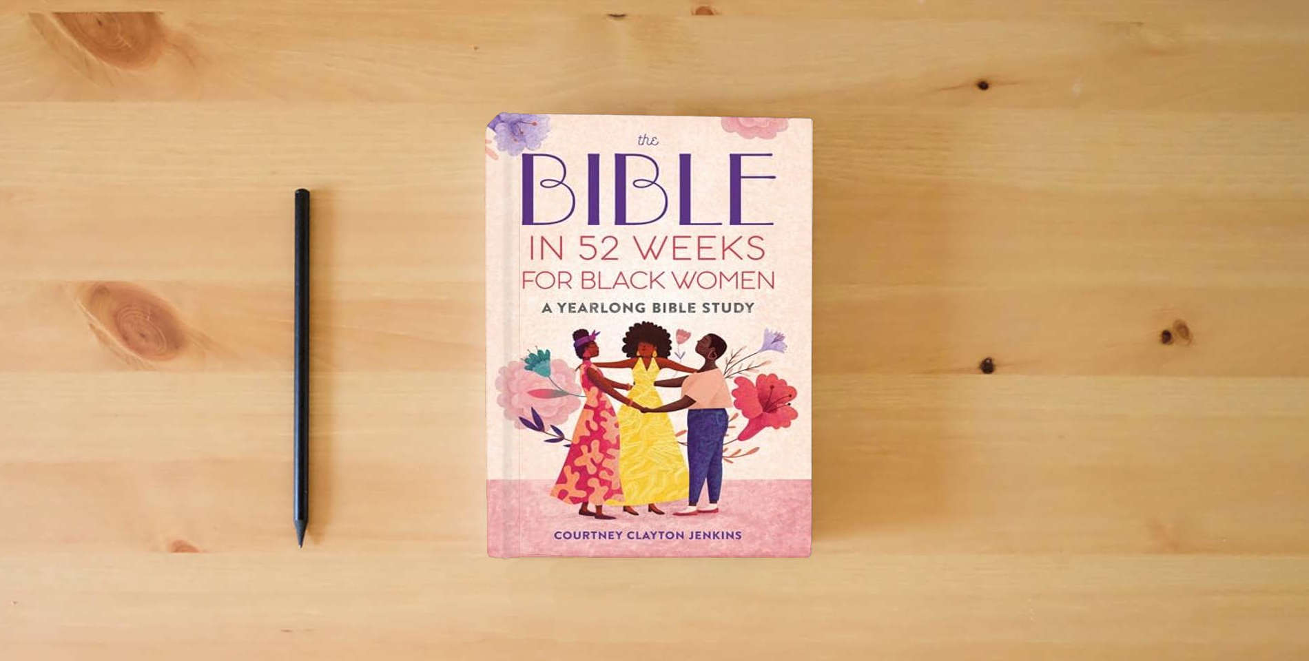 The book The Bible in 52 Weeks for Black Women: A Yearlong Bible Study is on the table