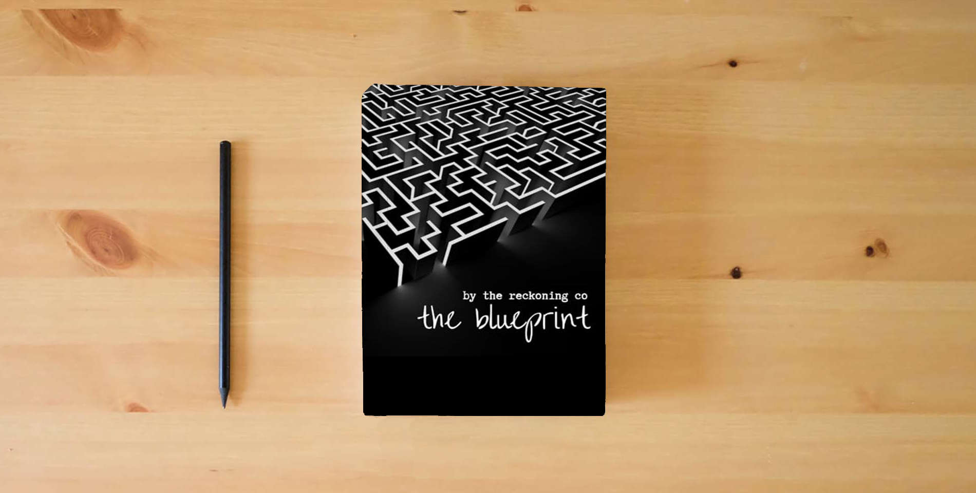 The book The Blueprint: A Channeled Theory of Consciousness is on the table