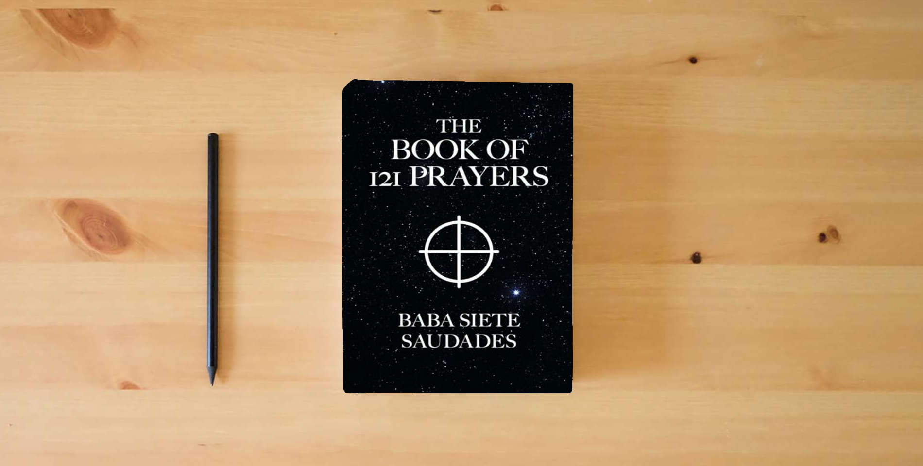 The book The Book of 121 Prayers is on the table