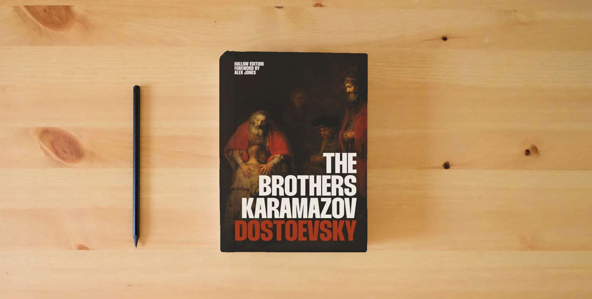 The book The Brothers Karamazov (Hallow Edition): The Classic Russian Novel of Faith, Doubt, and Redemption by Fyodor Dostoevsky (Christian Classics | Ave Maria Press) is on the table