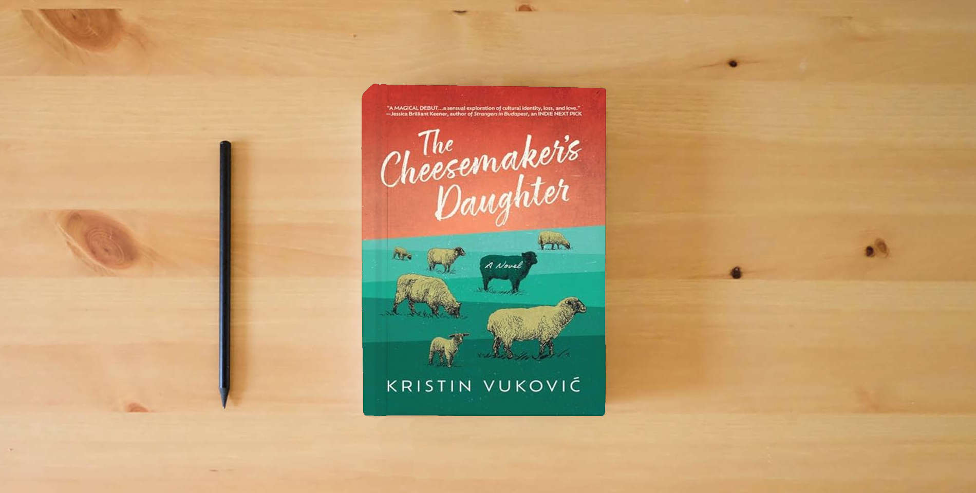 The book The Cheesemaker's Daughter is on the table