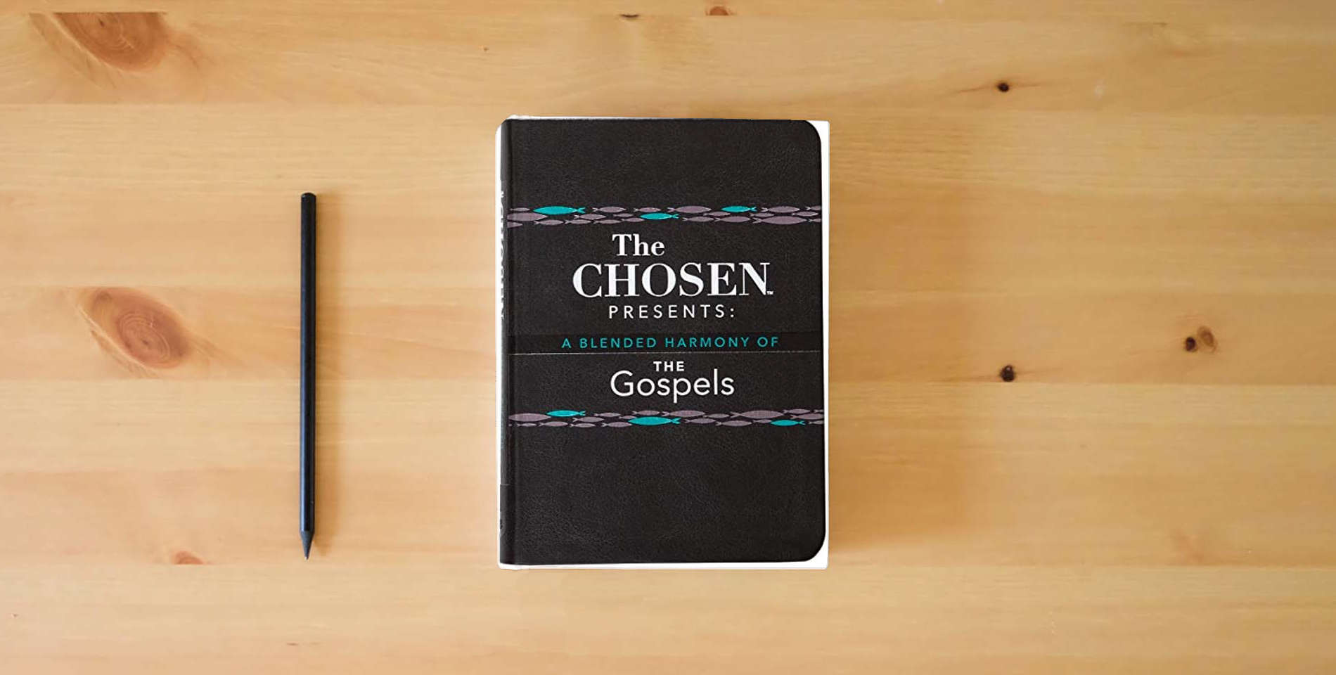 The book The Chosen Presents: A Blended Harmony of the Gospels is on the table