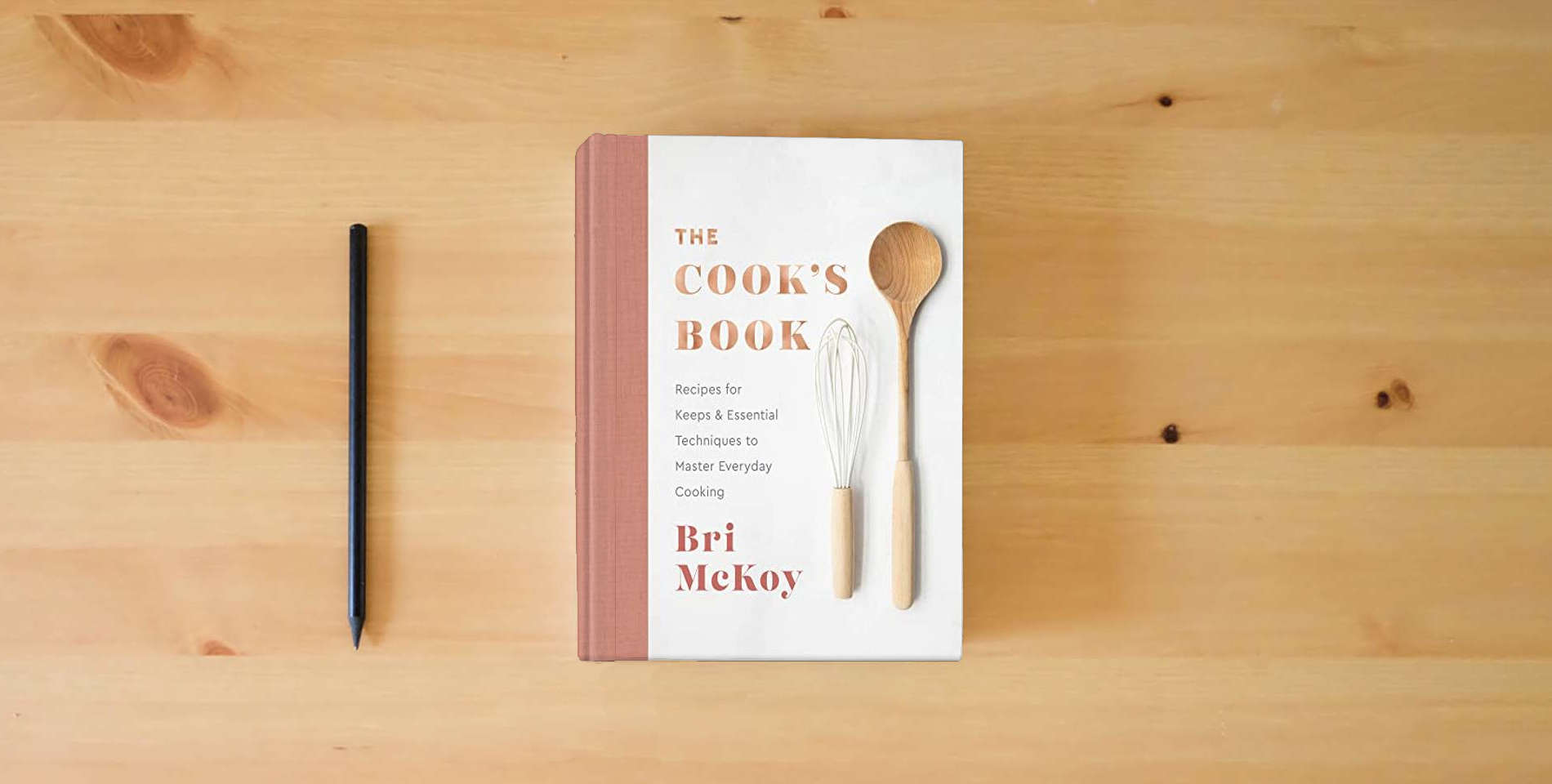 The book The Cook's Book: Recipes for Keeps & Essential Techniques to Master Everyday Cooking is on the table