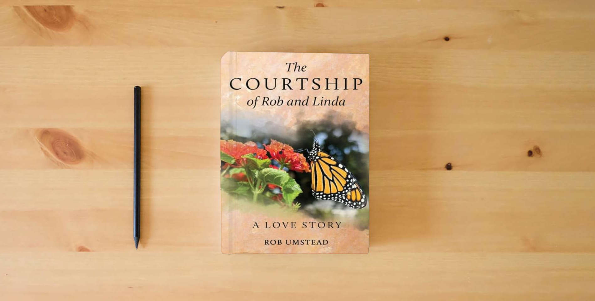 The book The Courtship of Rob and Linda: A Love Story is on the table