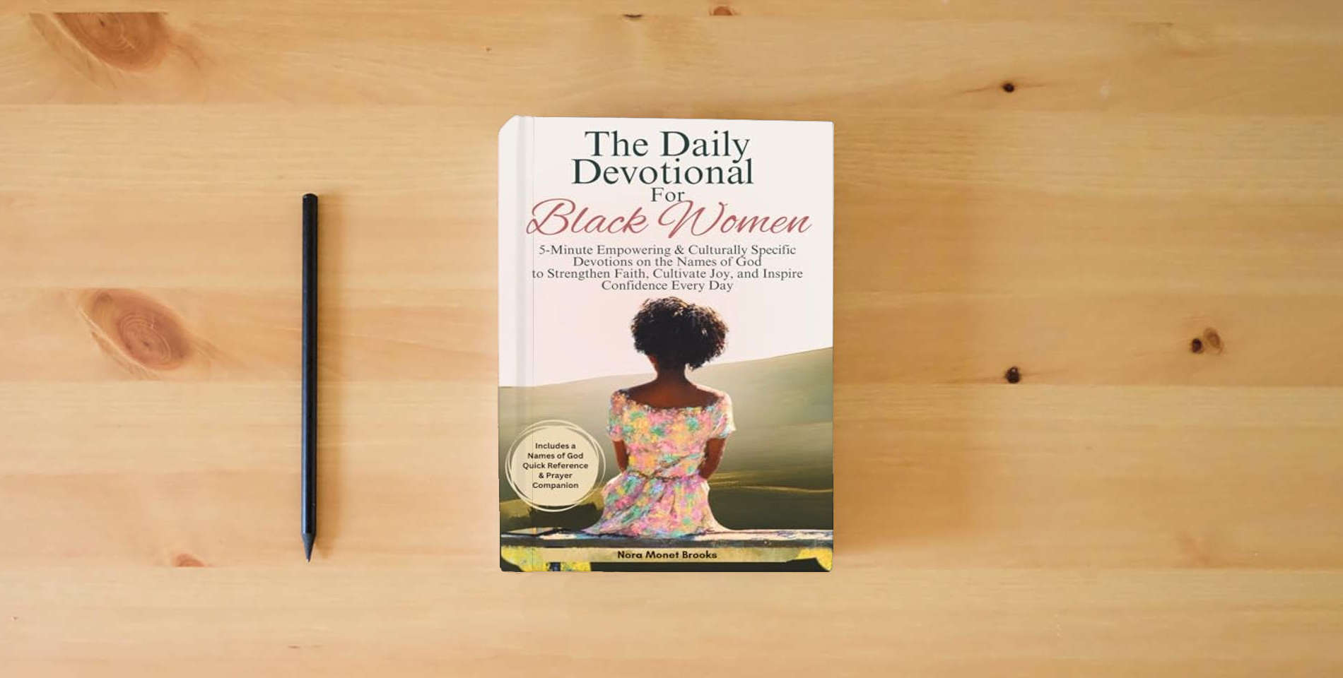 The book The Daily Devotional For Black Women: A Year of 5-Minute Empowering & Culturally Specific Devotions Based on The Names Of God to Strengthen Faith ... Gift Books) (Christian Books For Black Women) is on the table