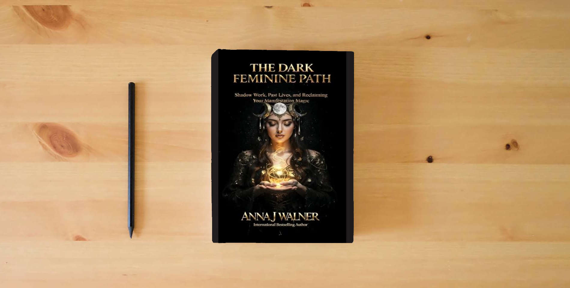 The book The Dark Feminine Path: Shadow Work, Past Lives, and Reclaiming Your Manifestation Magic is on the table