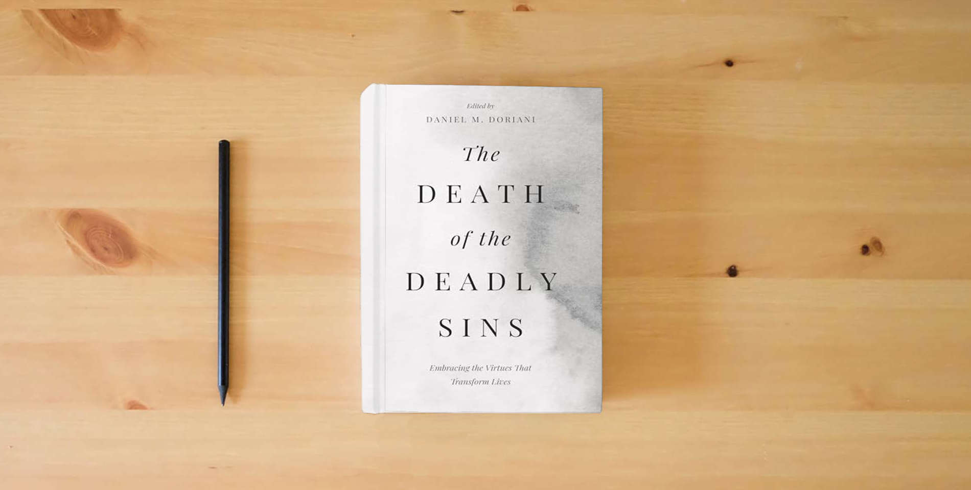 The book The Death of the Deadly Sins: Embracing the Virtues That Transform Lives is on the table