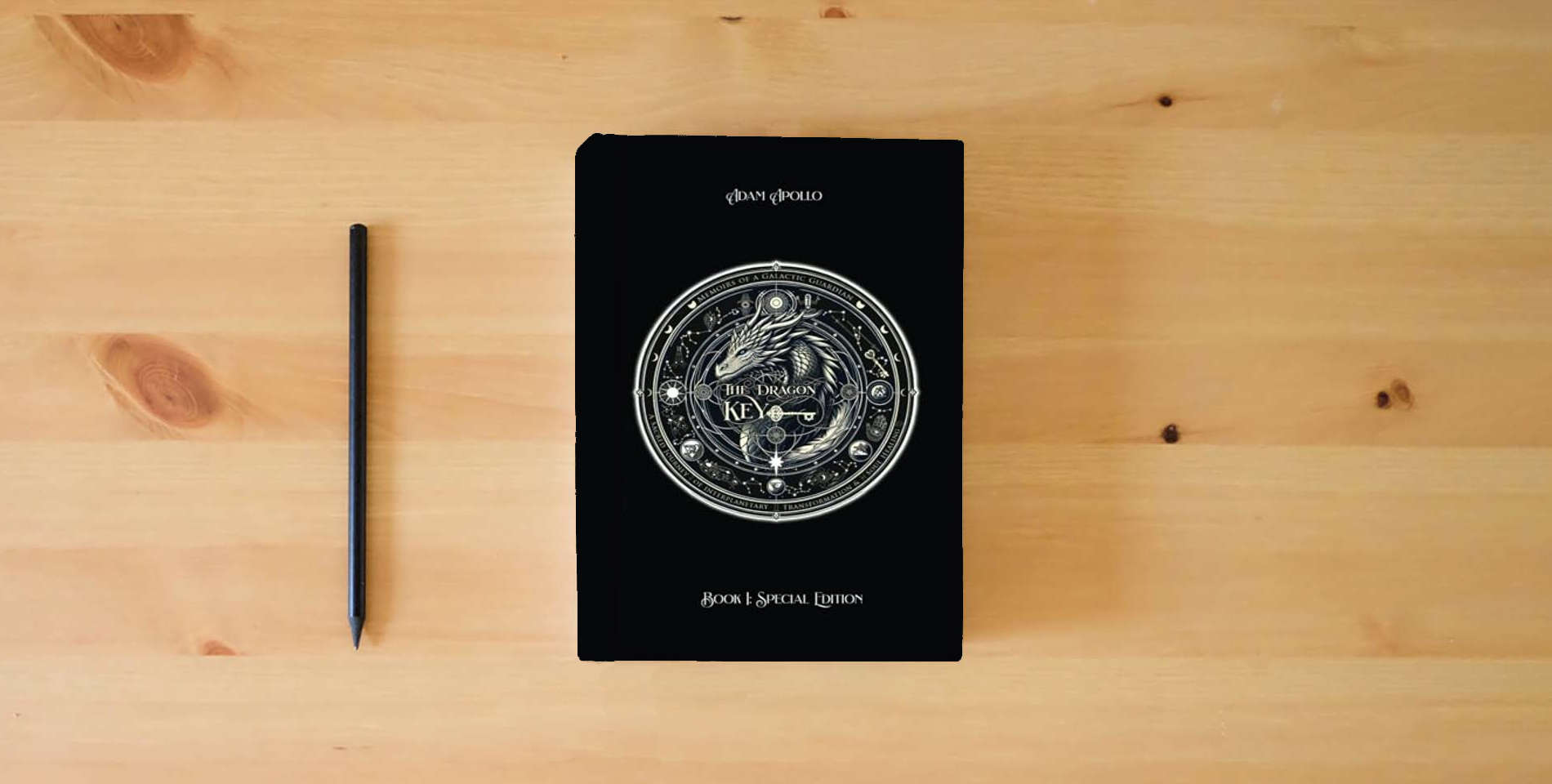The book The Dragon Key - Special Edition: Book I: Memoirs of a Galactic Guardian (The Dragon Key Series) is on the table
