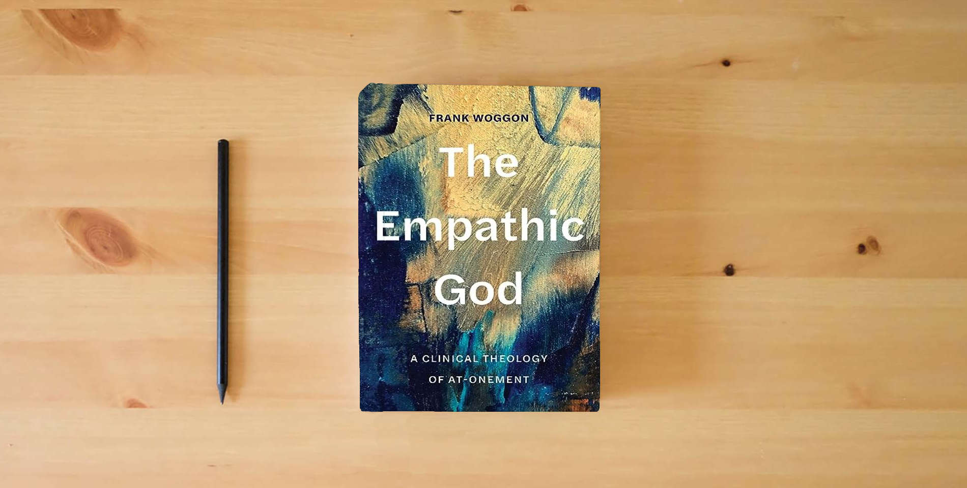 The book The Empathic God: A Clinical Theology of At-Onement is on the table