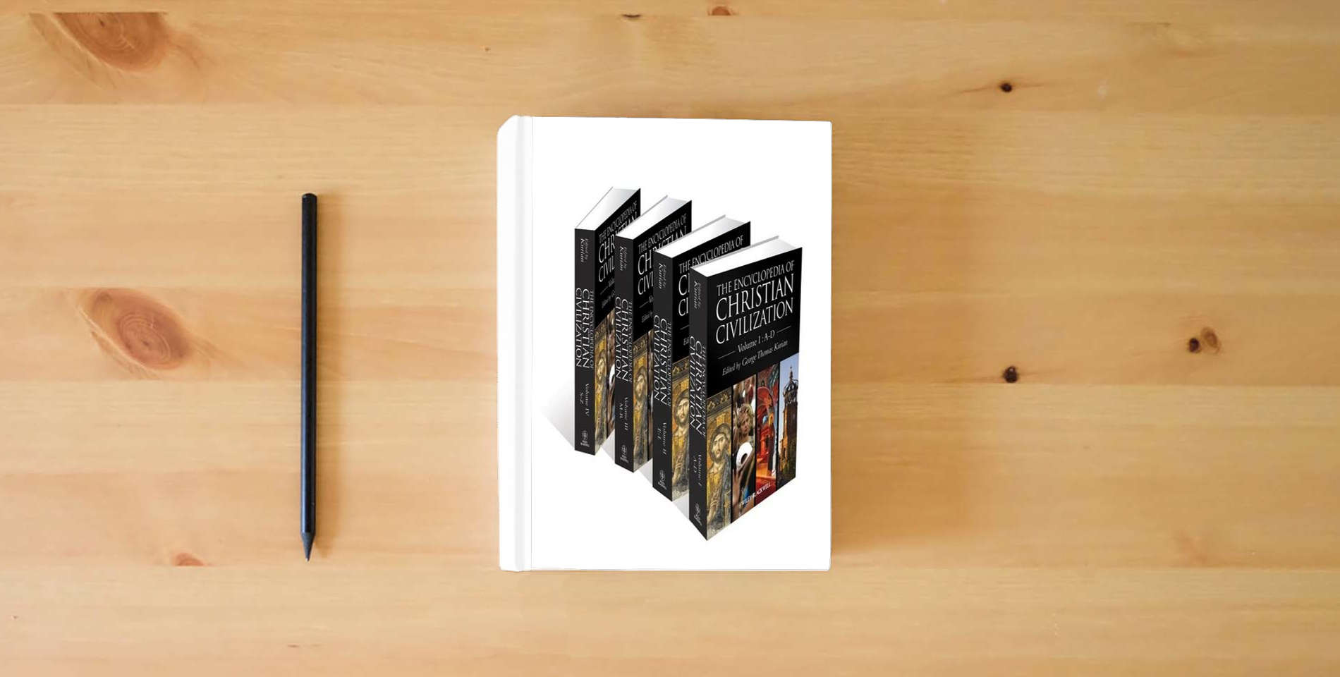 The book The Encyclopedia of Christian Civilization (4 Volume Set) is on the table