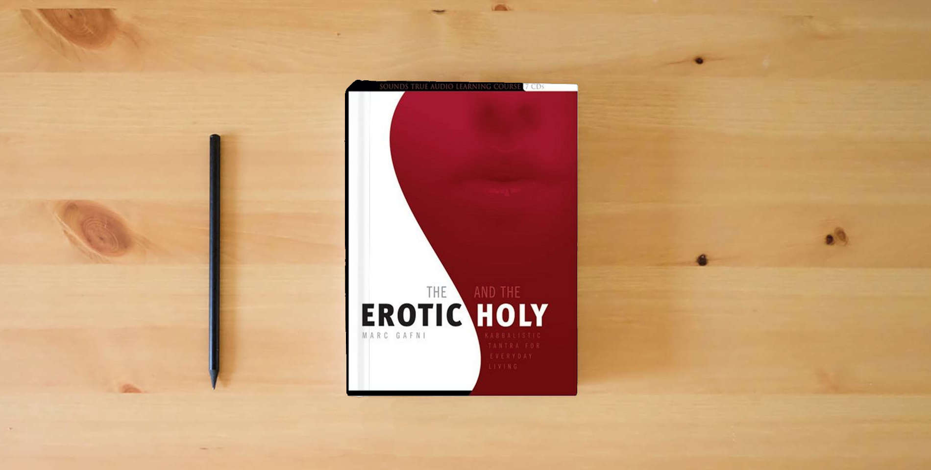 The book The Erotic and the Holy is on the table