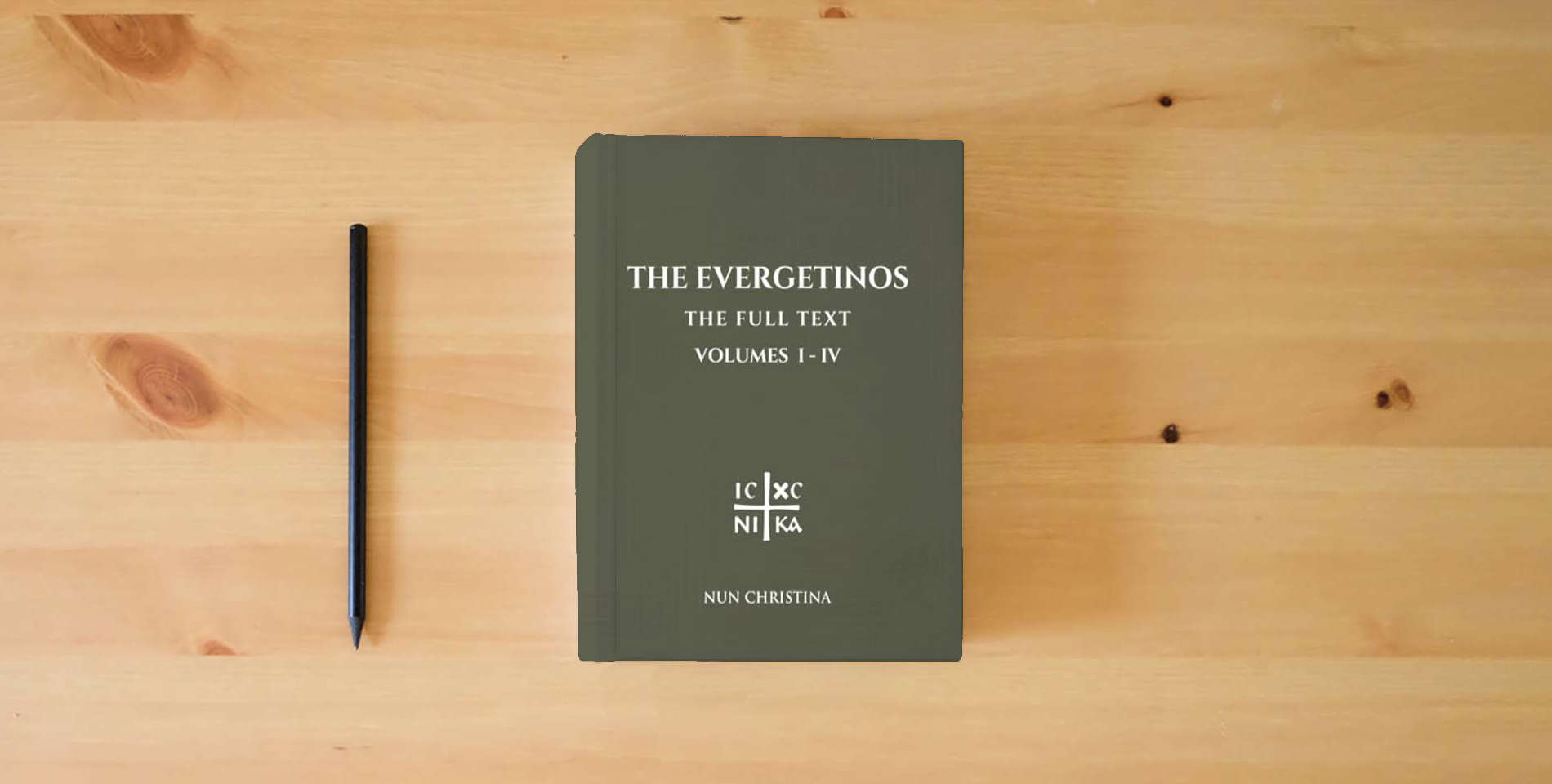 The book The Evergetinos Volumes 1 - 4: The Full Text is on the table