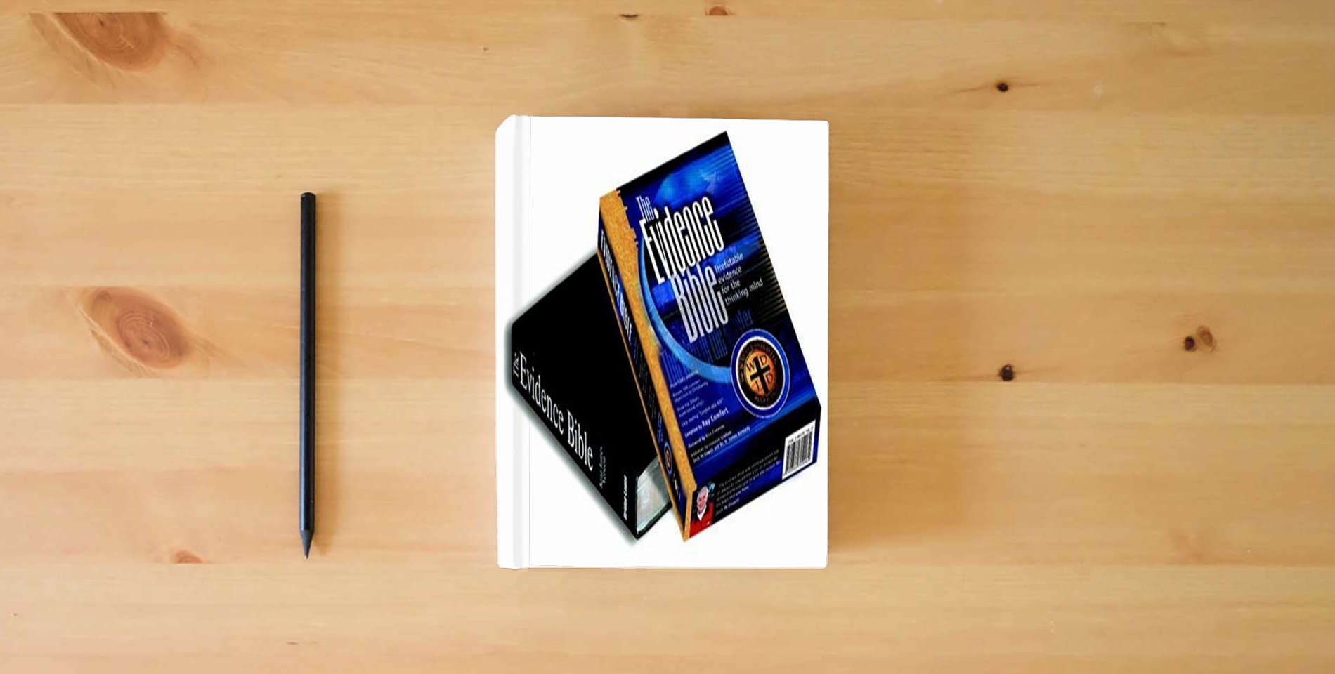 The book The Evidence Bible, Comfortable King James Version is on the table