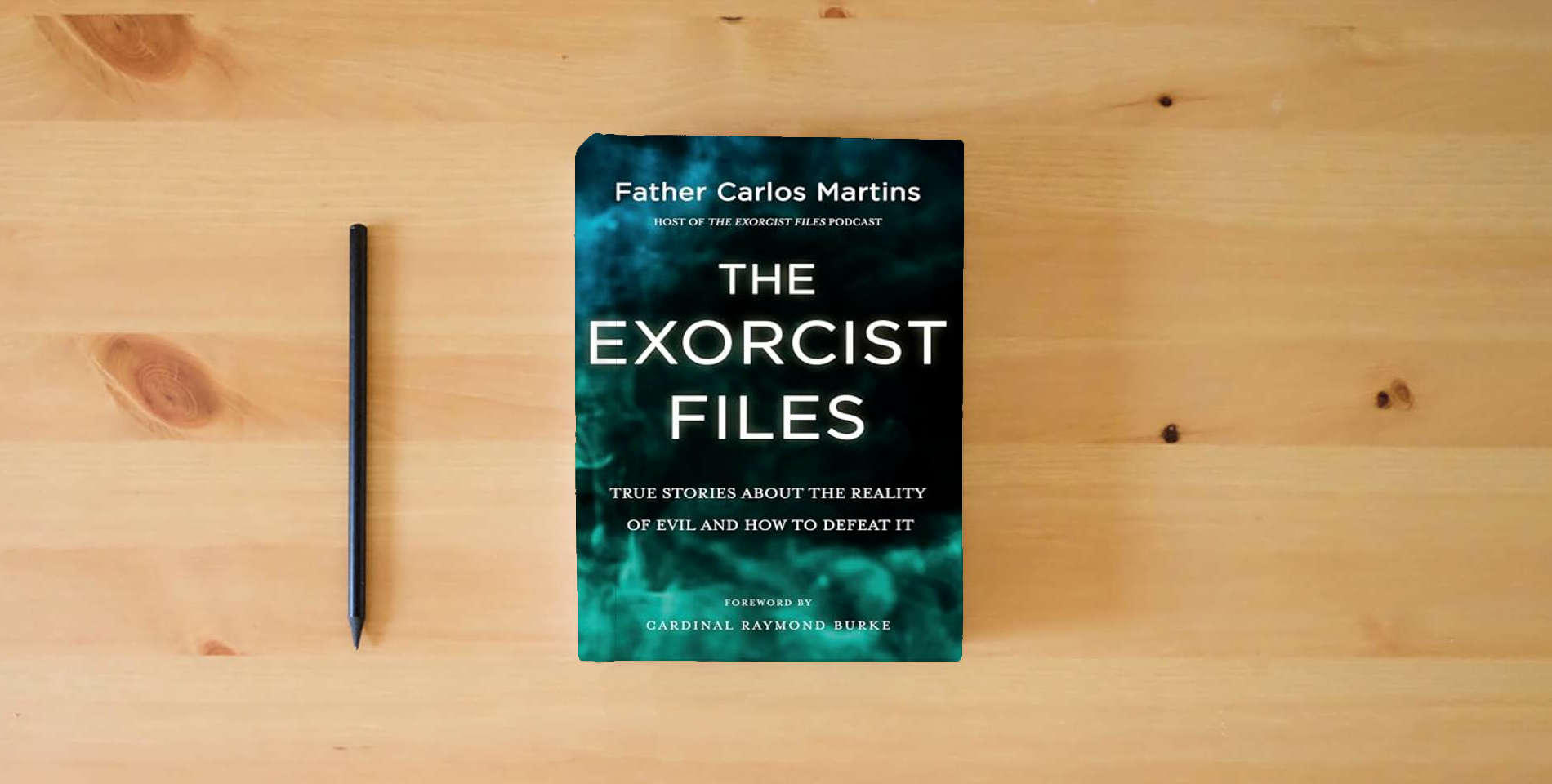The book The Exorcist Files: True Stories About the Reality of Evil and How to Defeat It is on the table