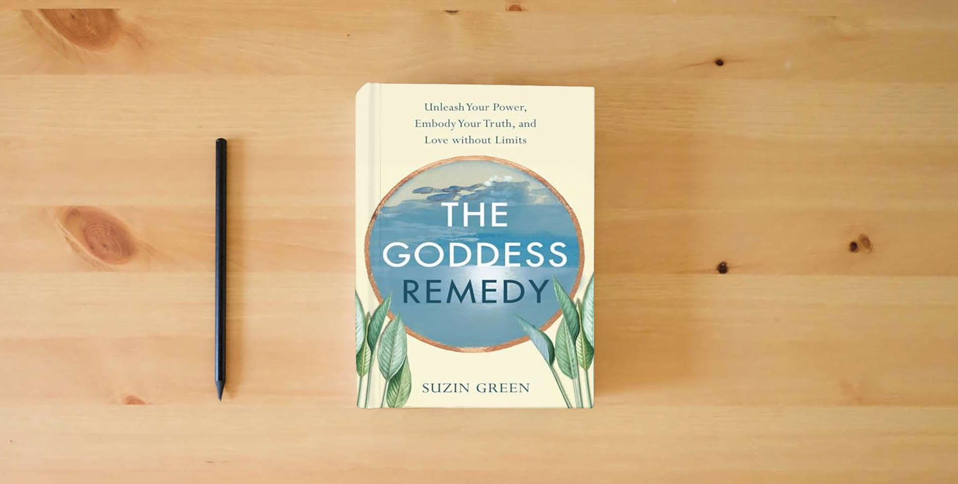 The book The Goddess Remedy: Unleash Your Power, Embody Your Truth, and Love without Limits is on the table