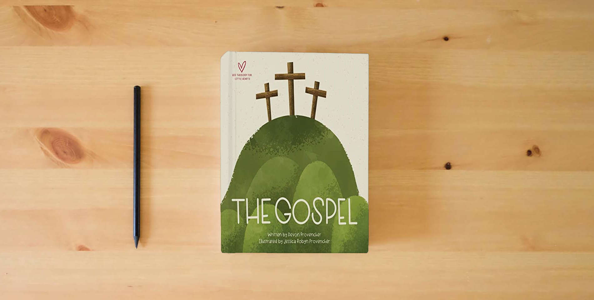 The book The Gospel (Big Theology for Little Hearts) is on the table