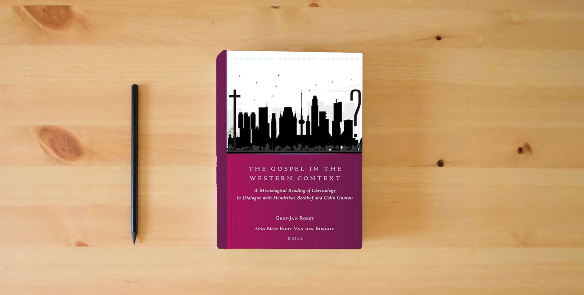 The book The Gospel in the Western Context: A Missiological Reading of Christology in Dialogue with Hendrikus Berkhof and Colin Gunton (Studies in Reformed Theology, 37) is on the table