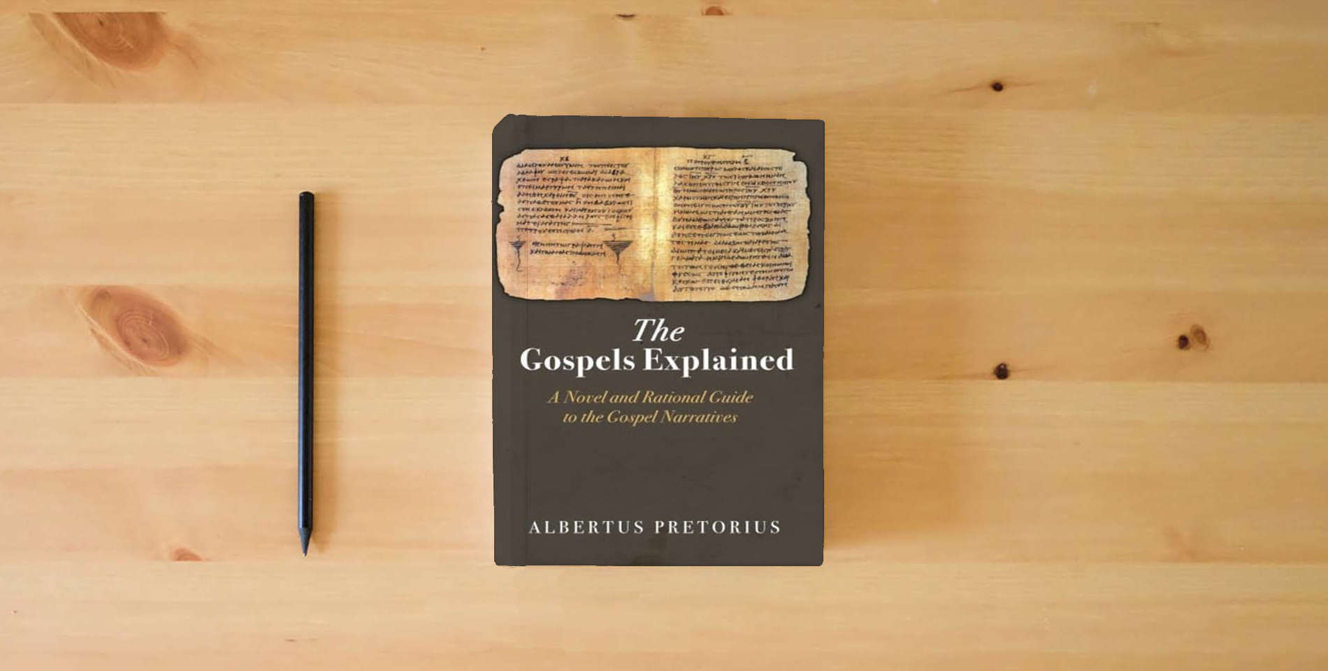 The book The Gospels Explained: A Novel and Rational Guide to the Gospel Narratives is on the table