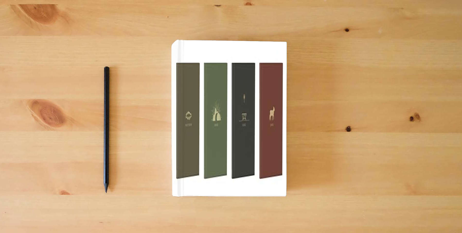 The book The Gospels - In the Word is on the table