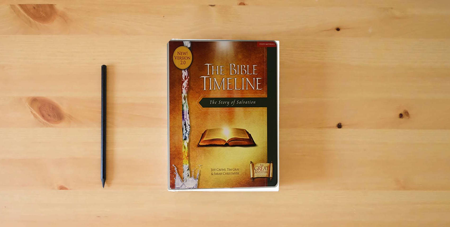 The book The Great Adventure Bible Timeline Study Kit: Study Materials is on the table