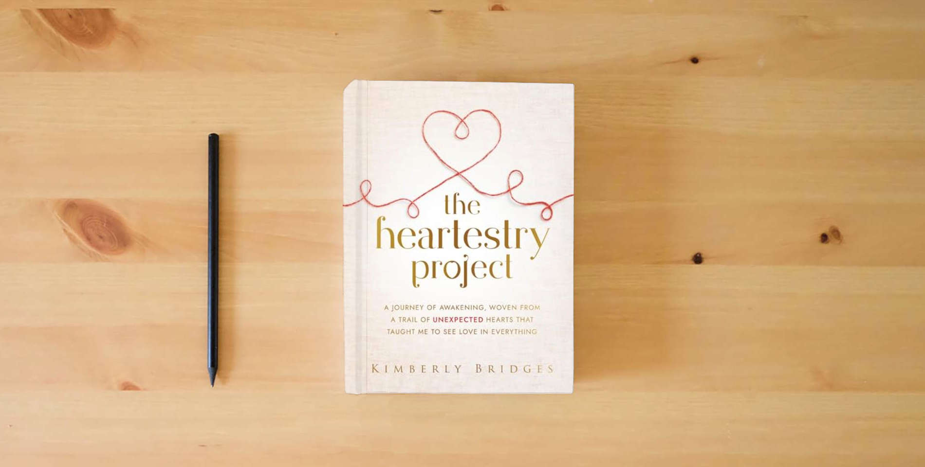The book The Heartestry Project: A Journey of Awakening, Woven From a Trail of Unexpected Hearts That Taught Me to See Love in Everything is on the table
