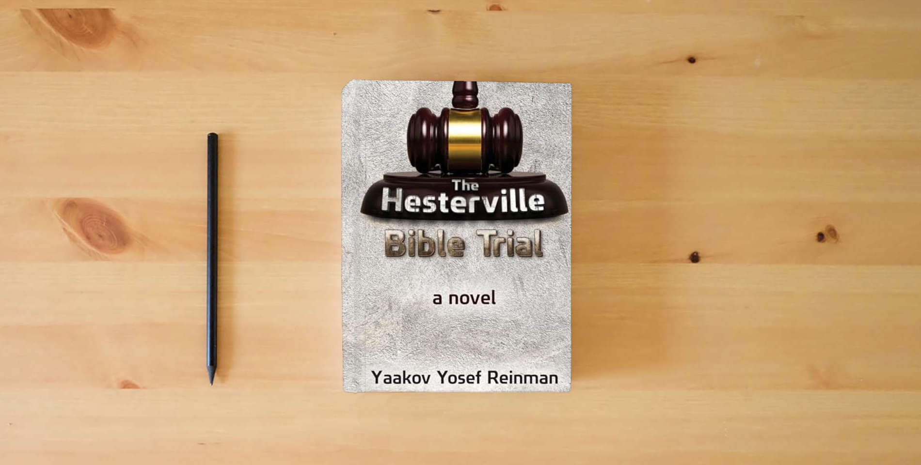 The book The Hesterville Bible Trial is on the table