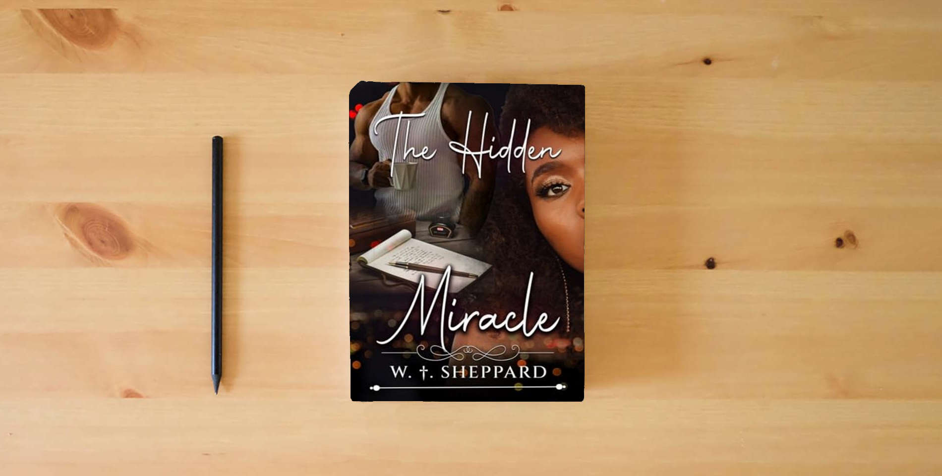 The book The Hidden Miracle is on the table