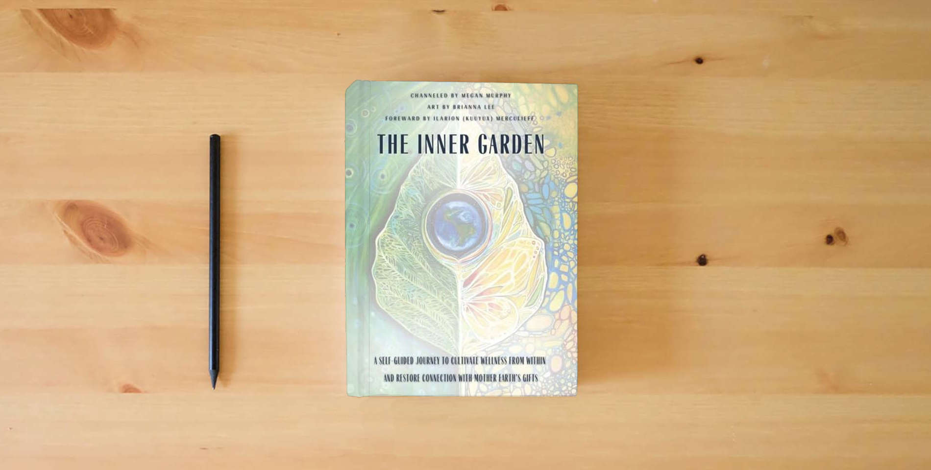 The book The Inner Garden: A self-guided journey to cultivate wellness from within and restore connection with Mother Earth's gifts is on the table
