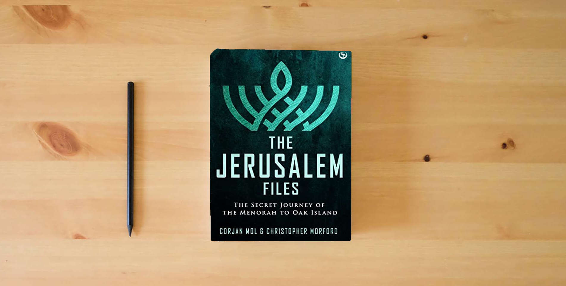 The book The Jerusalem Files: The Secret Journey of the Menorah to Oak Island is on the table