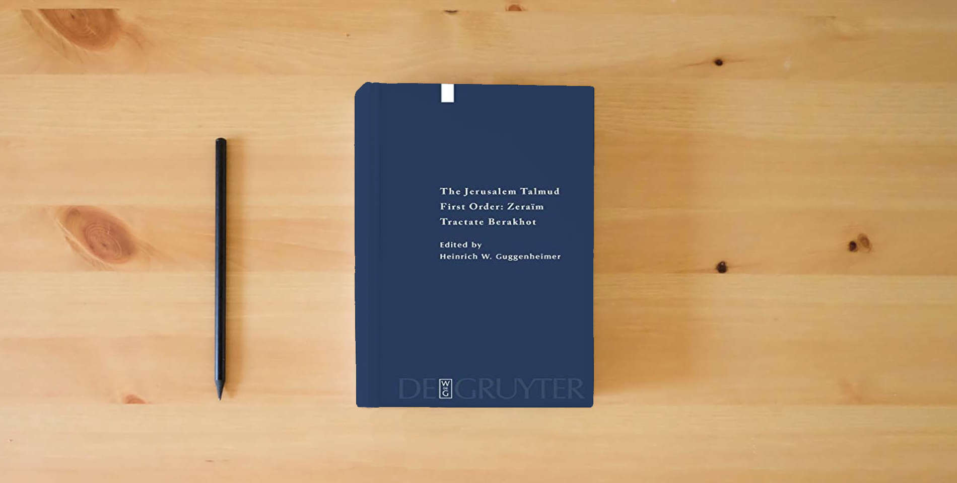 The book The Jerusalem Talmud: First Order: Zeraim Tractate Berakhot (Studia Judaica, Bd. 18) (Studia Judaica, 18) is on the table