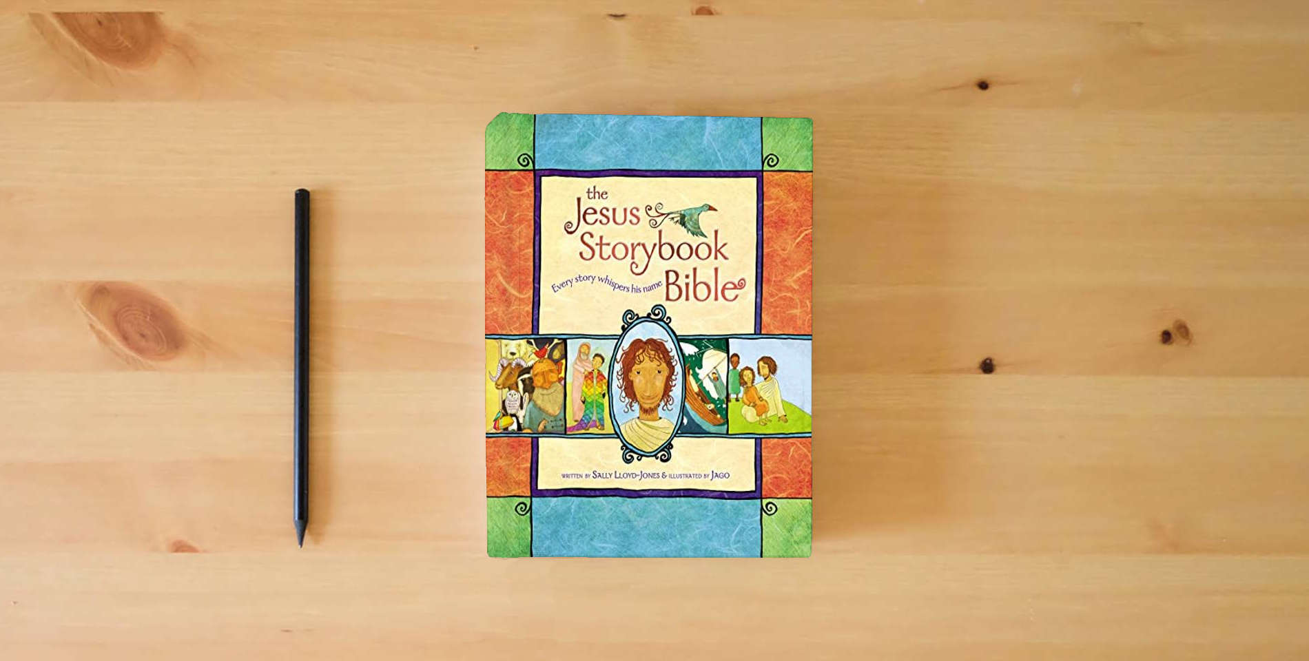 The book The Jesus Storybook Bible: Every Story Whispers His Name is on the table