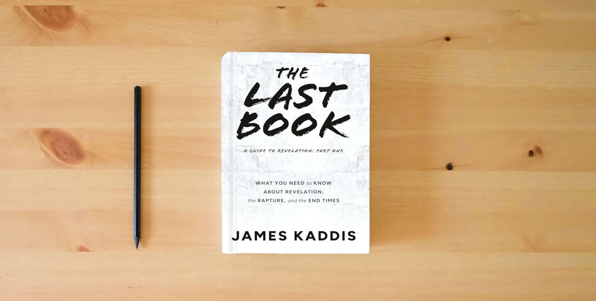 The book The Last Book: What You Need to Know About Revelation, the Rapture, and the End Times (A Guide to Revelation) is on the table