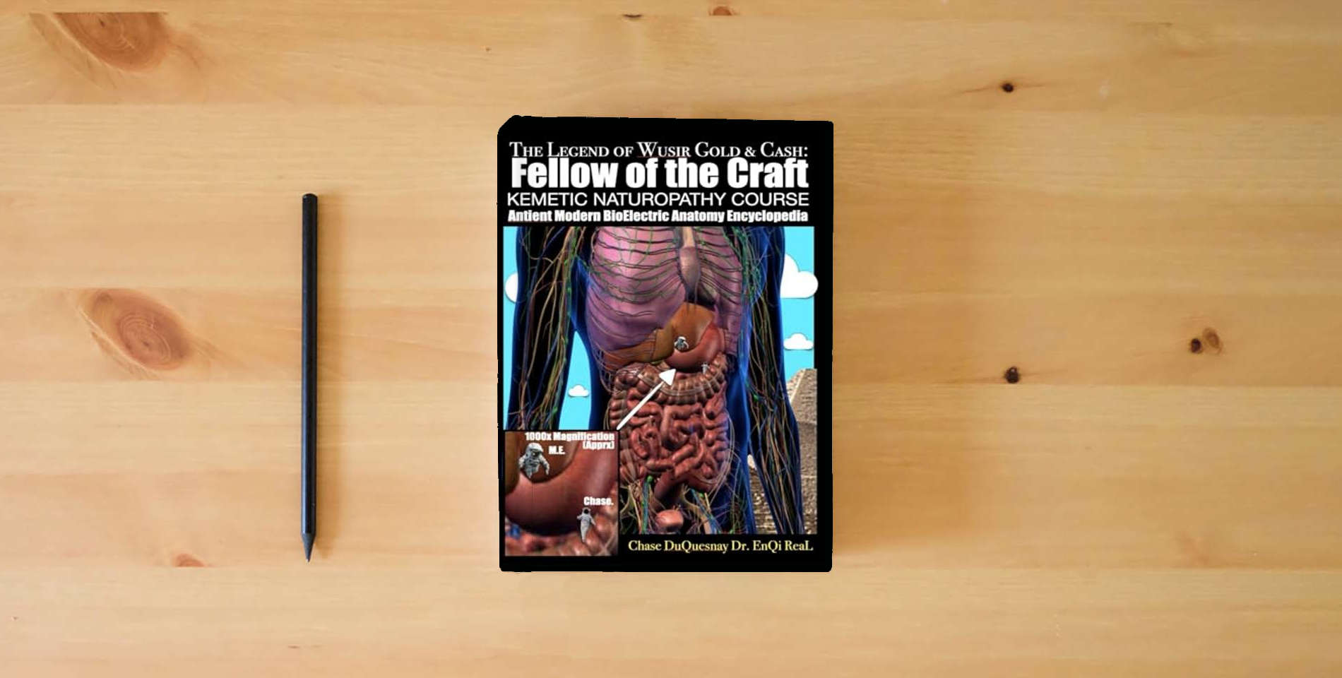The book The Legend of Wusir, Gold & Cash, Fellow of the Craft: Antient Modern BioElectric Anatomy Encyclopedia: KEMETIC NATUROPATHY COURSE (TRUE & LIVING KEMETIC SCIENCE) is on the table