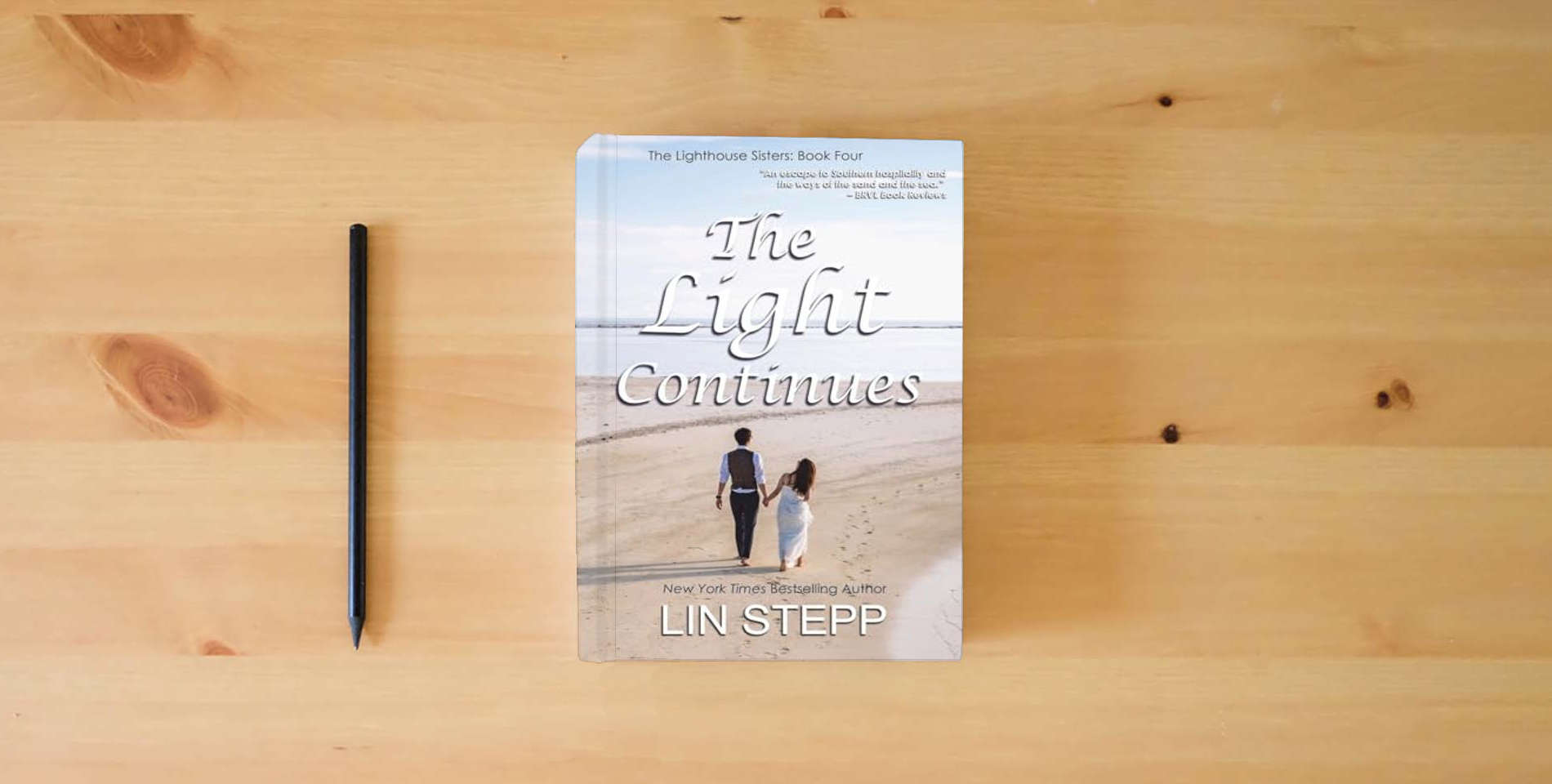 The book The Light Continues is on the table