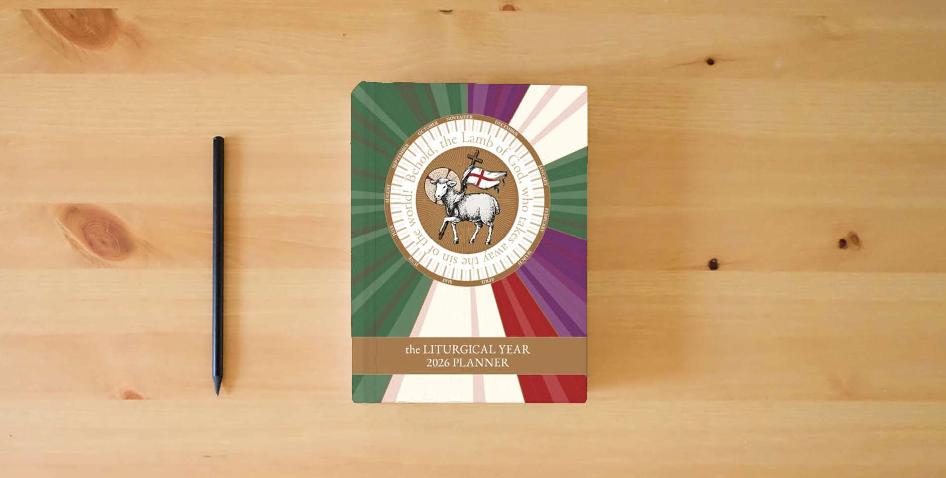 The book The Liturgical Year 2026 Planner is on the table