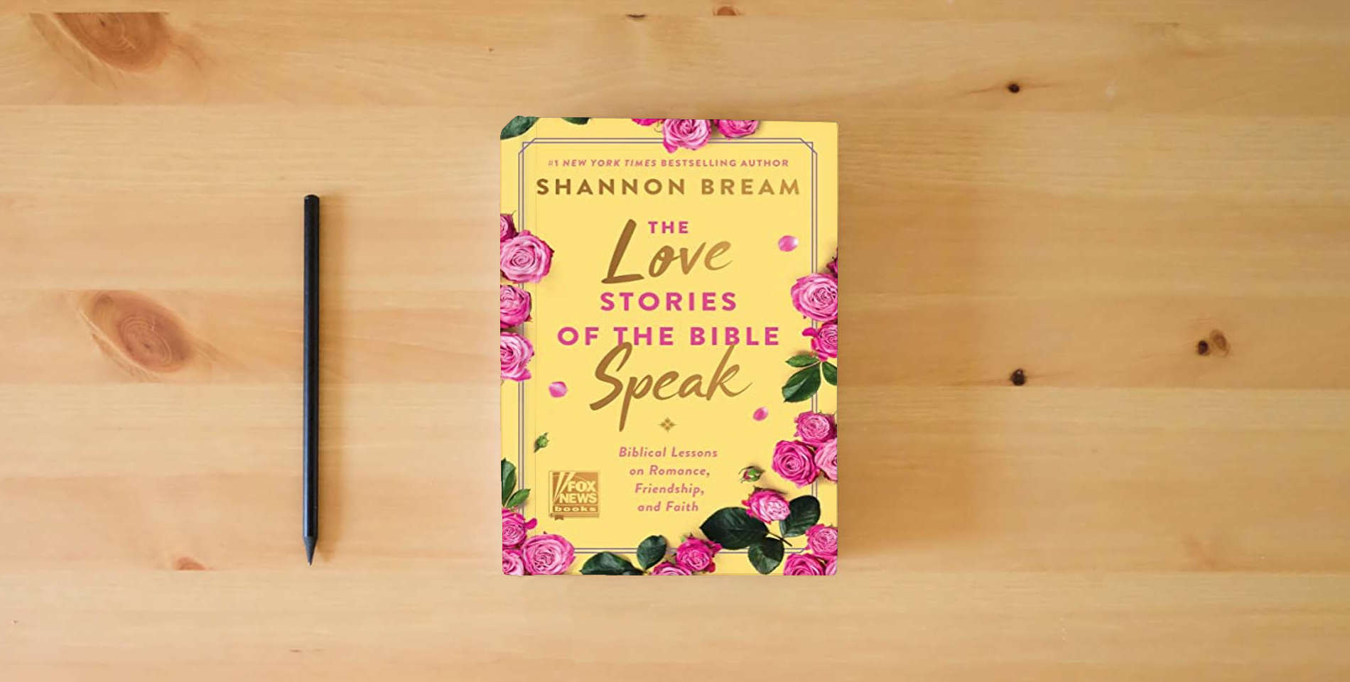The book The Love Stories of the Bible Speak: Biblical Lessons on Romance, Friendship, and Faith (Fox News Books) is on the table