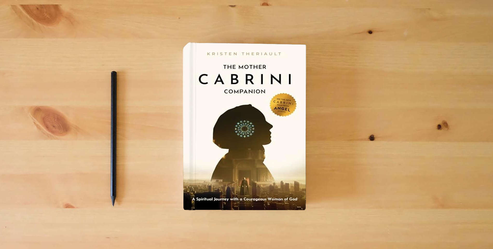 The book The Mother Cabrini Companion: A Spiritual Journey with a Courageous Woman of God is on the table