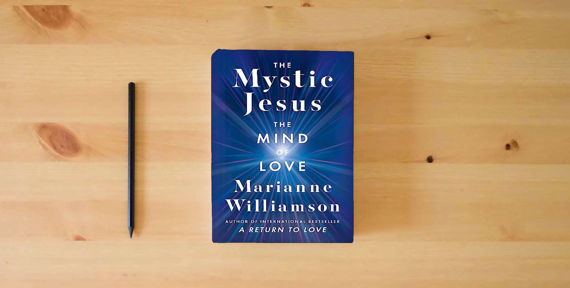 The book The Mystic Jesus: The Mind of Love is on the table