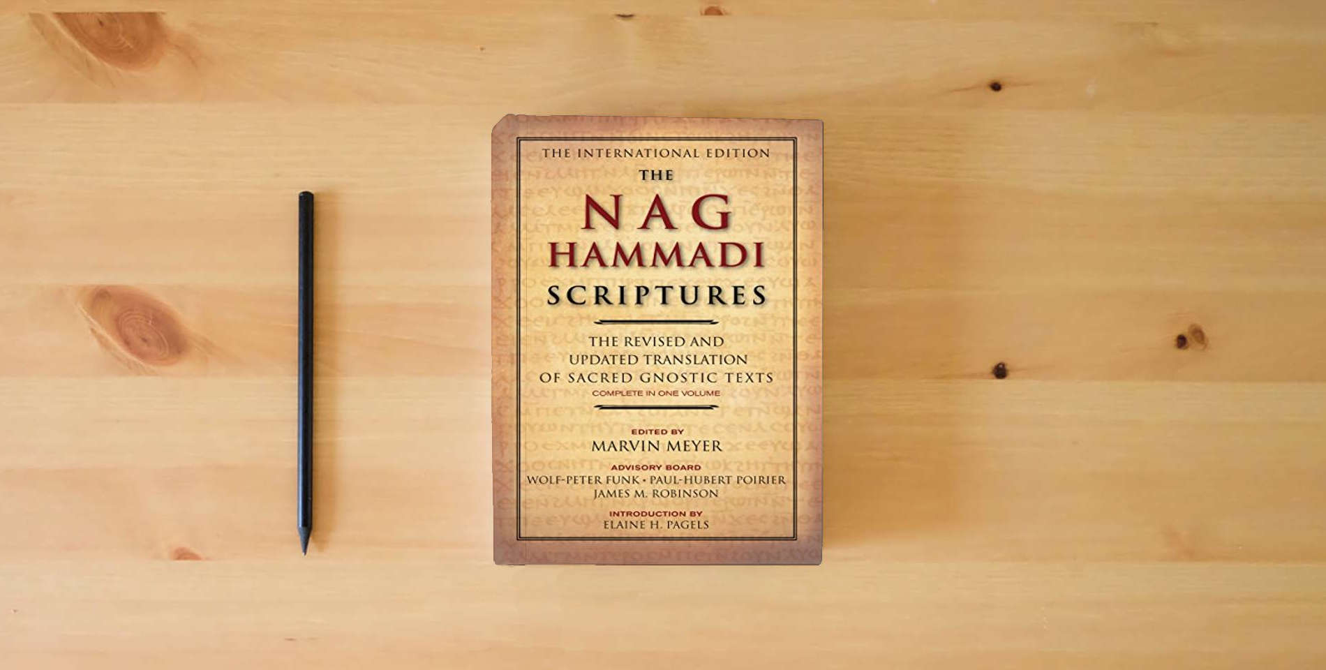 The book The Nag Hammadi Scriptures: A Study of Gnostic Scriptures and Early Christian Thought is on the table