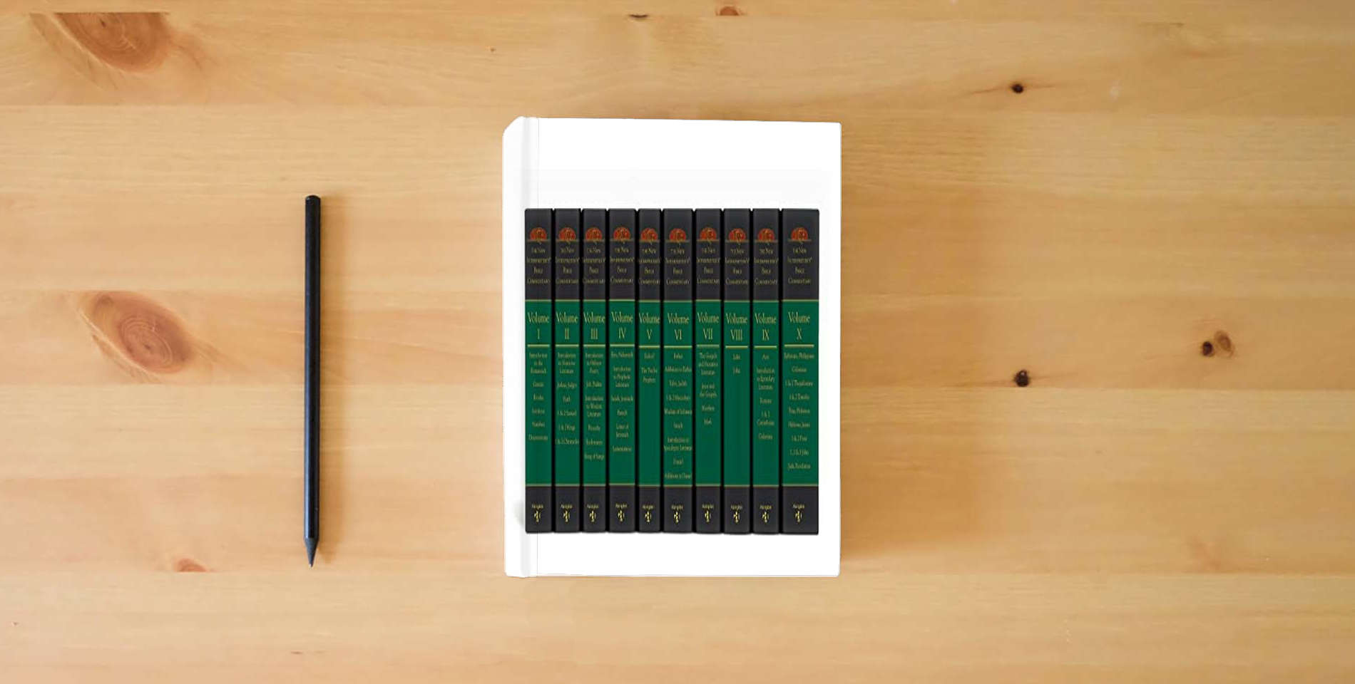 The book The New Interpreter's® Bible Commentary Ten Volume Set is on the table