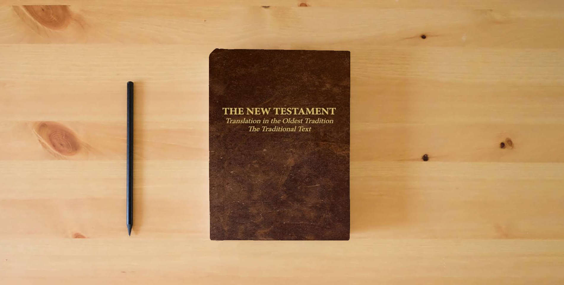 The book The New Testament - Translation in the Oldest Tradition: The Traditional Text is on the table