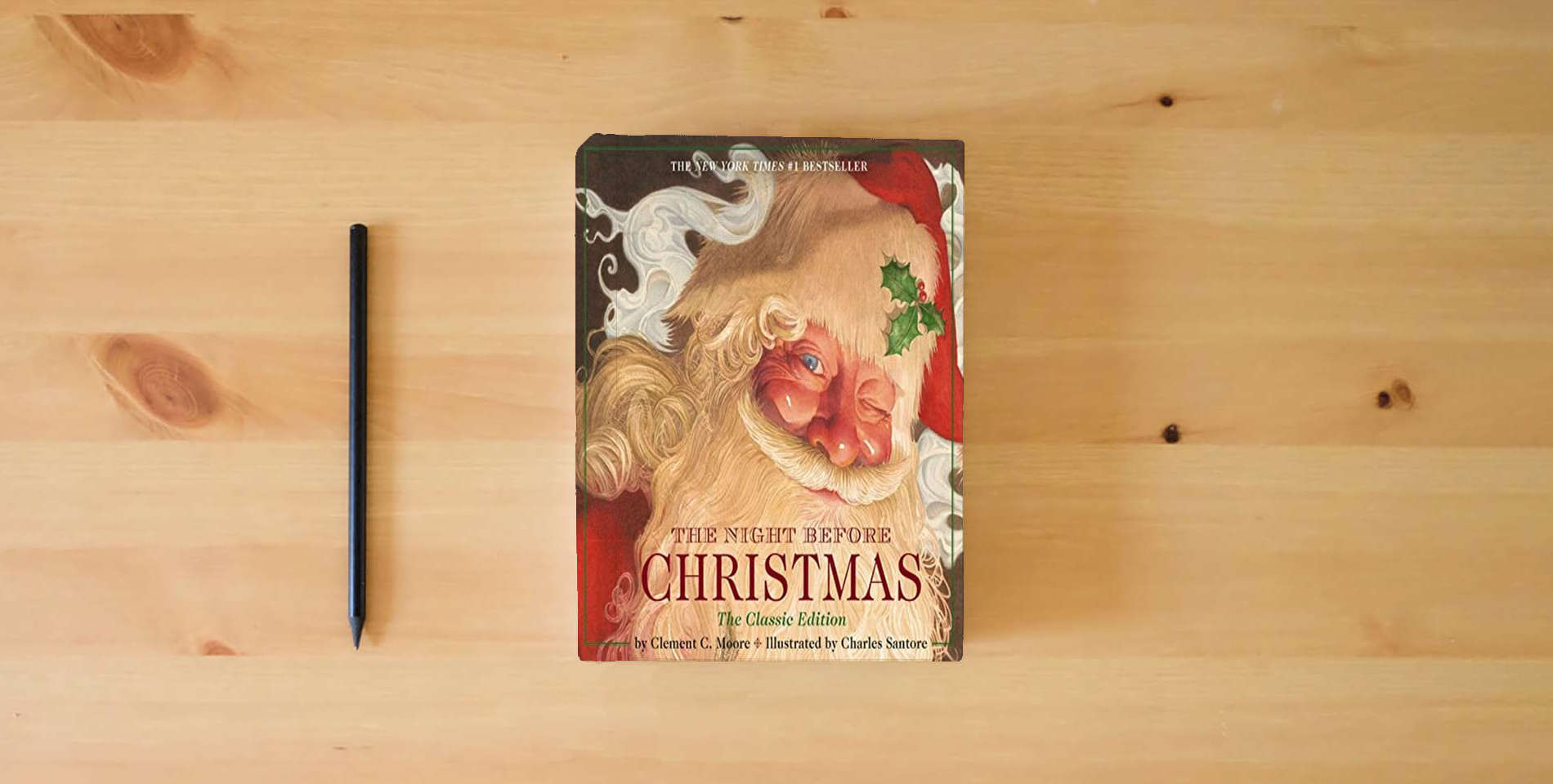 The book The Night Before Christmas Hardcover: The Classic Edition, The New York Times Bestseller (Christmas Book) is on the table