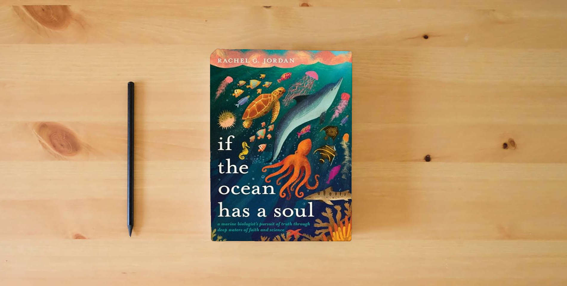 The book If the Ocean Has a Soul: A Marine Biologist's Pursuit of Truth through Deep Waters of Faith and Science is on the table