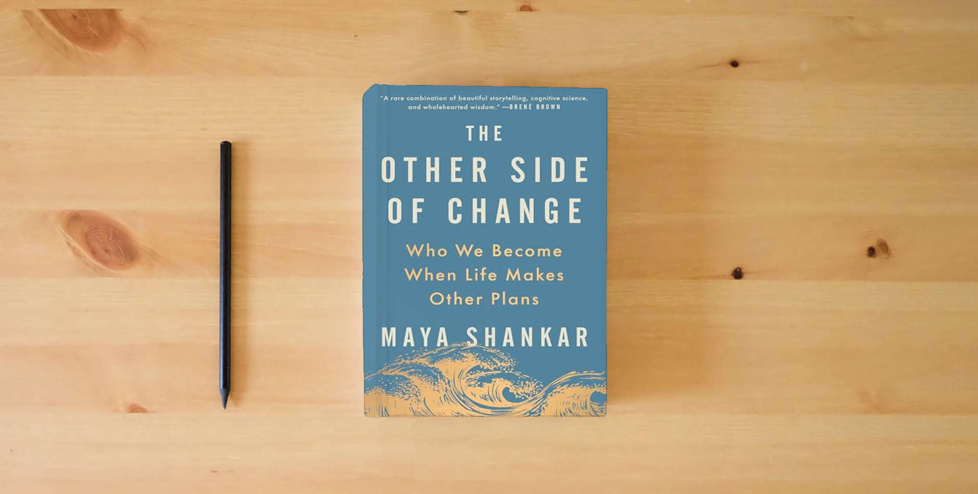The book The Other Side of Change: Who We Become When Life Makes Other Plans is on the table